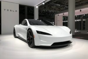 white lamborghini aventador parked in building