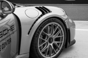 white and black car on road